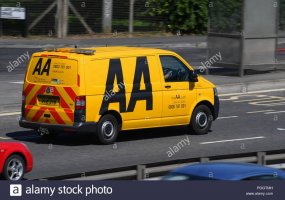 aa-breakdown-van-travelling-along-a-road-PGGTMH.jpg